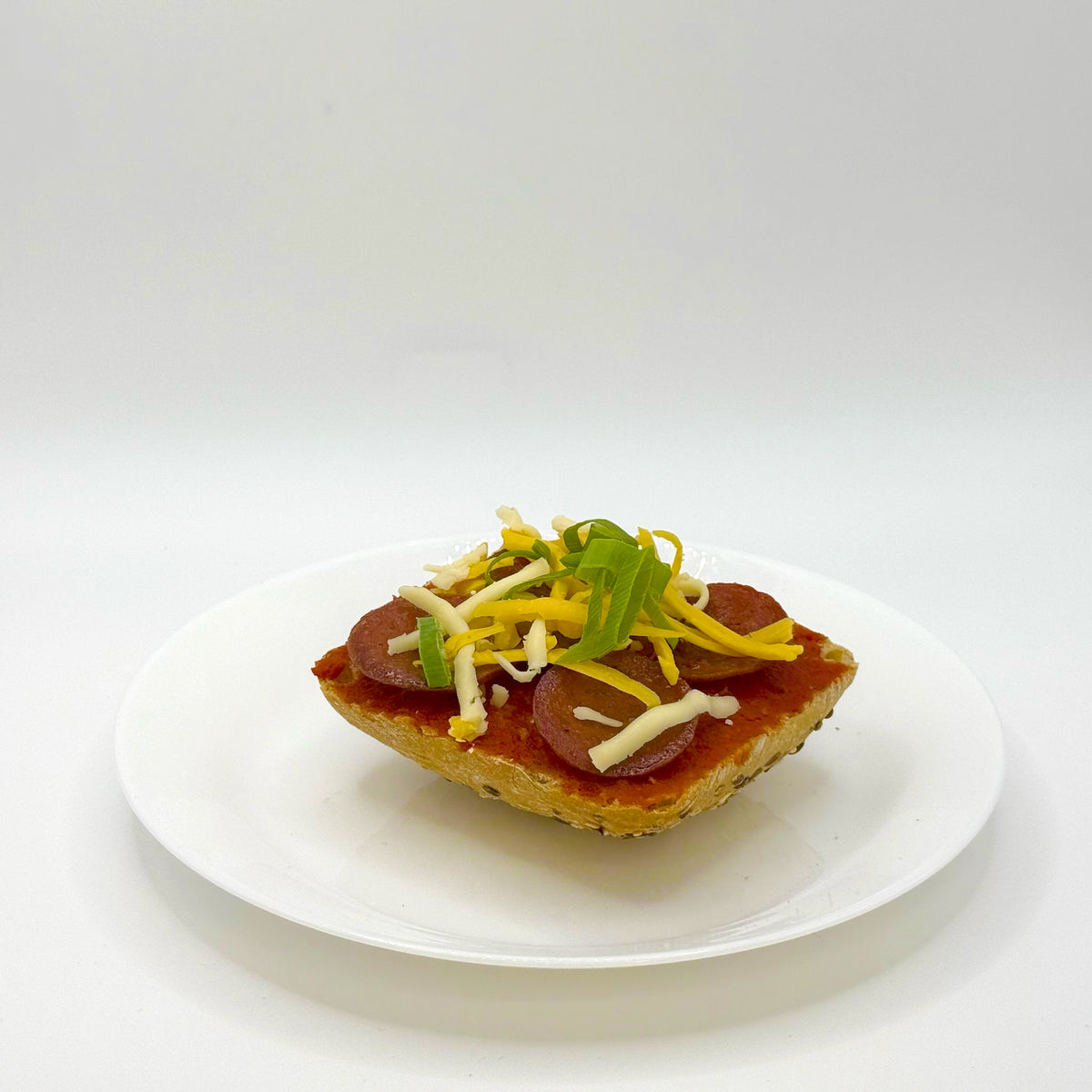 half a multigrain roll with sucuk 
